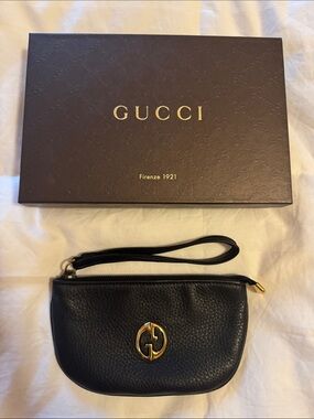 Gorgeous Gucci Black Pebbled Leather Wristlet with Gold GG Accent
